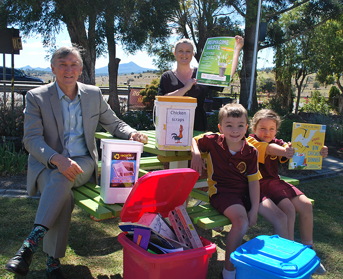 Mayor Greg Christensen talking with Roadvale State School Early Years Teacher Kylie Peel about the school's waste reduction activities with PiPs representatives Fraser Hawkins and Jessica Laegel and their 'Bin Chicken'.