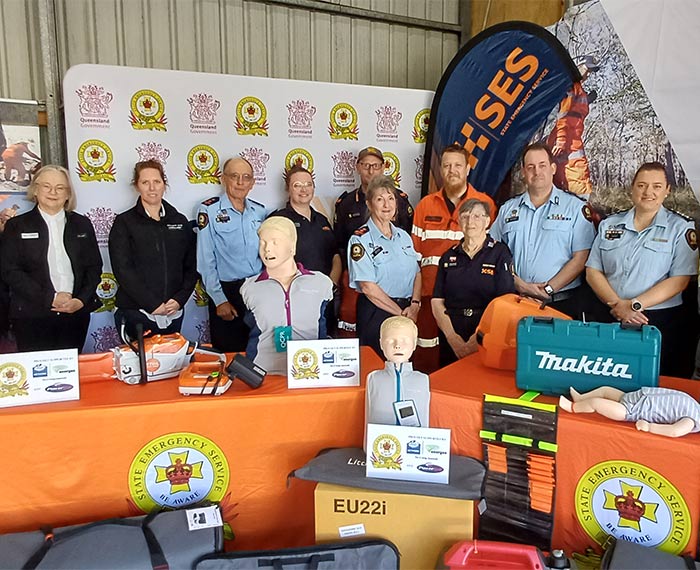 Image of people at SES equipment handover