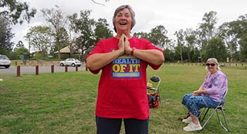 Image of Laughter Yoga instructor and participant